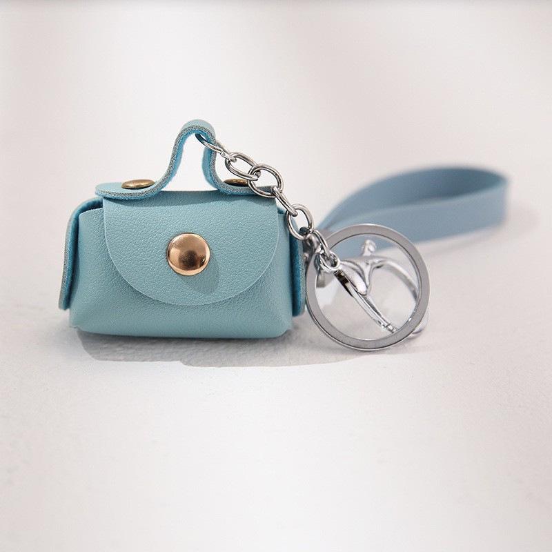 PU Leather Bracelet Coin Purse Keychain: Cute Mini Bag for Earphones & Data Cables