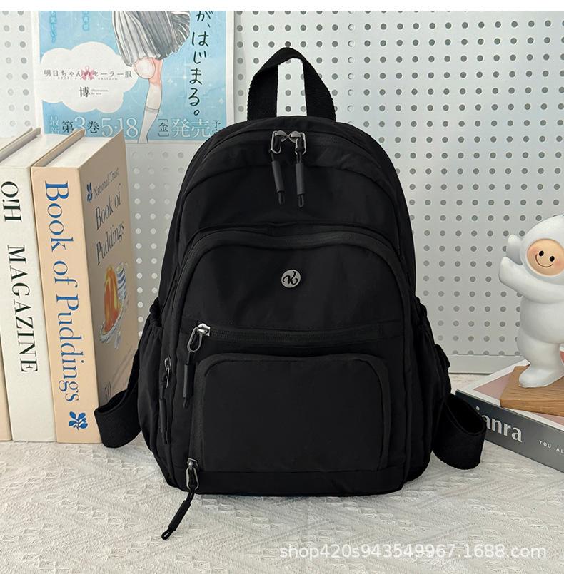 Schoolbag spot wholesale simple fashion backpack high sense niche women outdoor travel commuter small bag