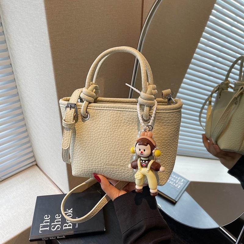 Fashion high-end hand bucket bag spring and summer simple and versatile shoulder bag trendy niche messenger bag