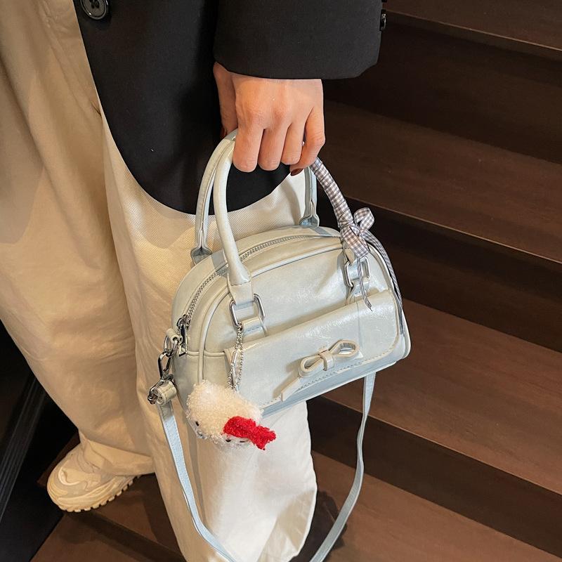 Super hot hand-held small bag women's spring bow kt toast bag silver versatile fashion shoulder crossbody bag
