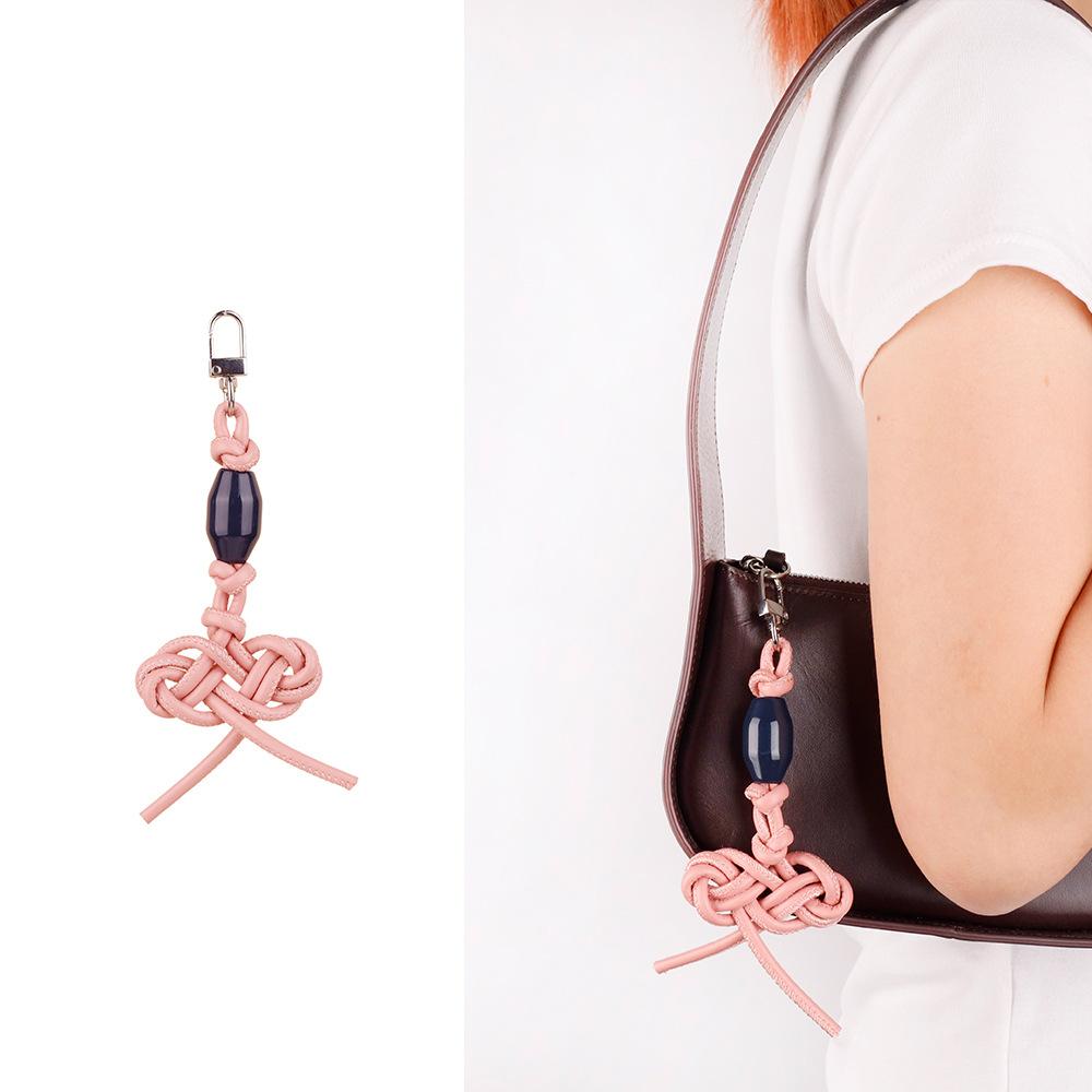 MIU series creative color hand-woven ruyi knot pu leather cord accessories bag pendant keychain