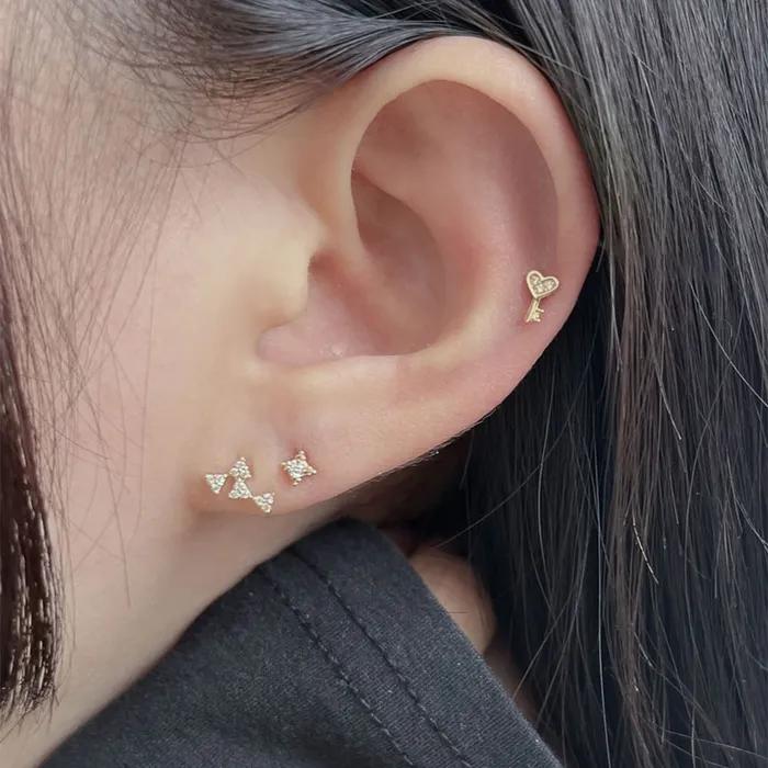 14k cubic flash piercing