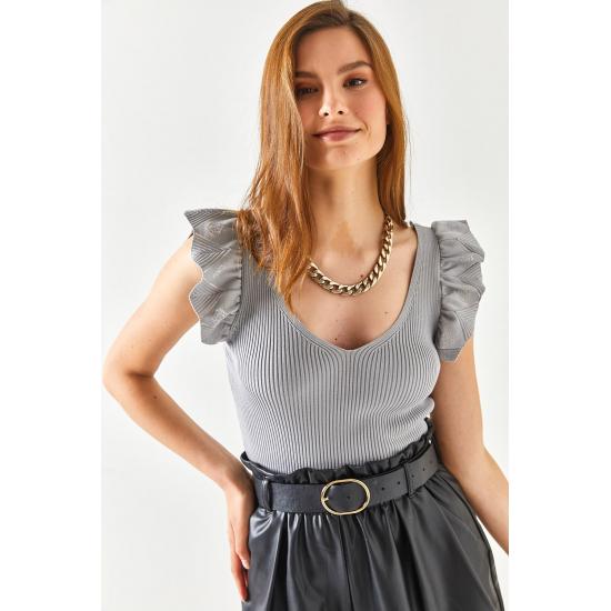 Damen-Strickbluse mit Rüschen vorne und hinten, V-Ausschnitt und Schultern