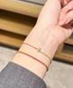 Women's Pure Silver Red Rope Bracelet - Niche Design, Handwoven New Year Jewelry