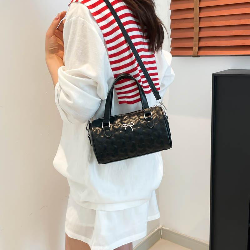 New summer popular casual and beautiful fresh solid color bow cylinder bag portable shoulder messenger bag women's bag