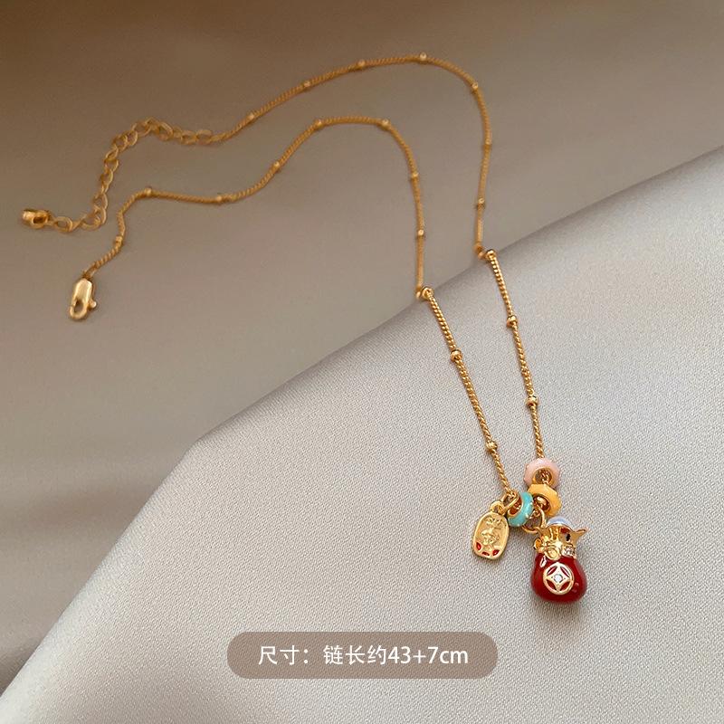 18k real gold electroplated zir*****il dripping lucky bag pendant necklace design clavicle chain autumn and winter temperament item decoration