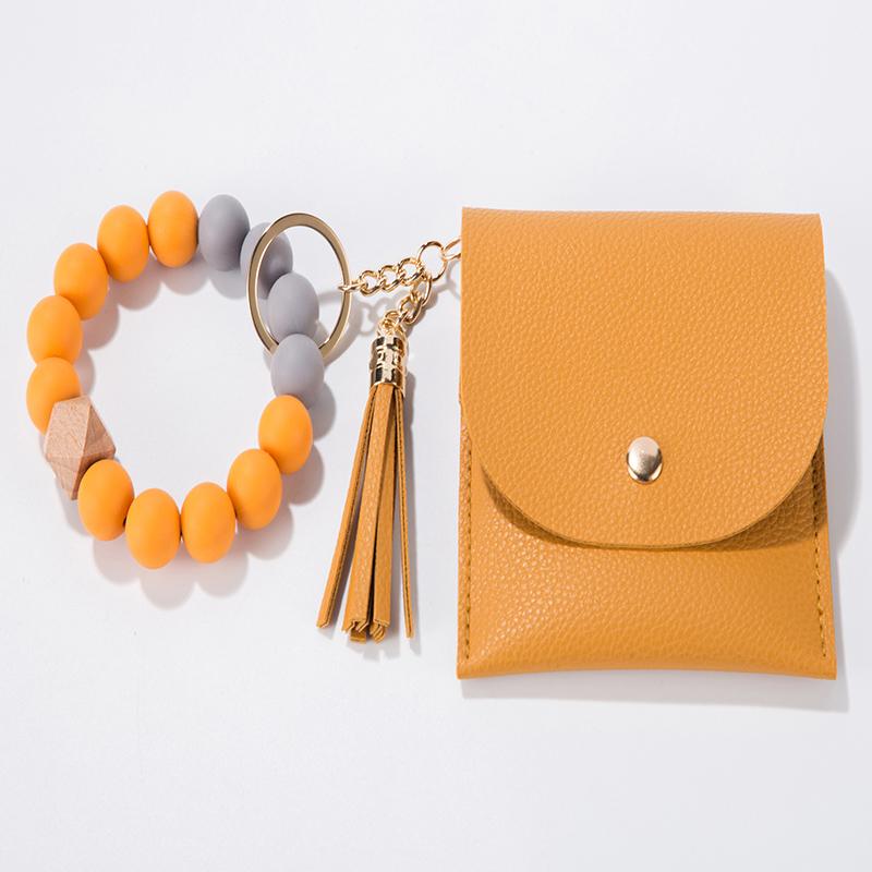 Food Grade Keychain Bracelet Silicone Wallet With Wood Bead and Wallet Women's Key Chain Bangle With Tassel and Purse