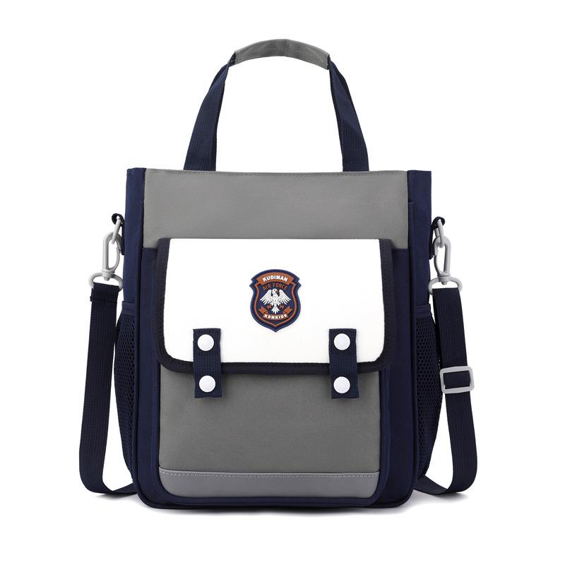 New lightweight tutoring bag boys and girls color matching large-capacity children's multi-functional double shoulder tutoring bag primary school bag