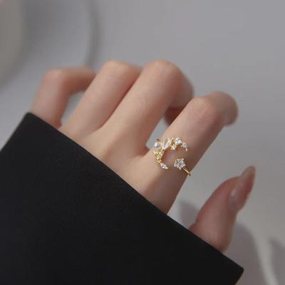 Bague étoile en zircon et lune euro-américaine: Bague index incrustée de perles à la mode et luxueuse