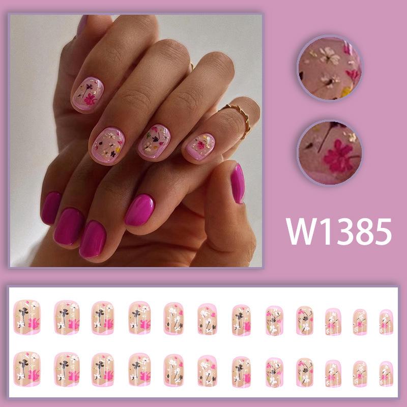 

Chic Floral Nail Art: Fresh, Sweet, and Instagram-Worthy in Rose Red—Gentle, Girly, and Elegantly Fairy-Like.