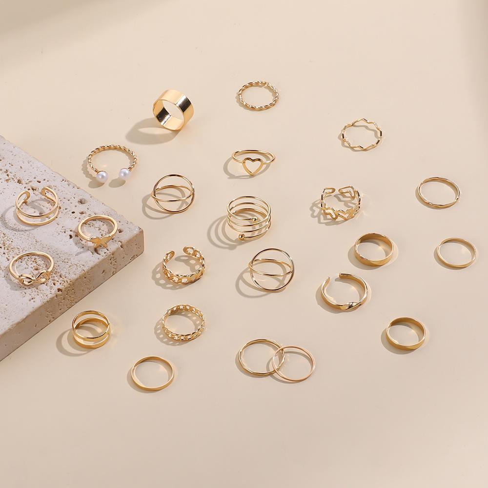 New Fashion Gold Pearl Love Butterfly Cross Hollow Opening 22-piece Suit Ring