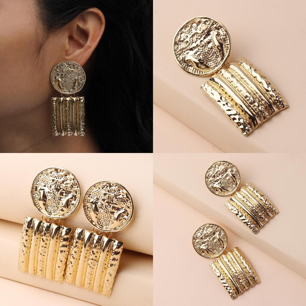 Contemporary Geometric Gold Metal Earrings With Relief Design For Collectors