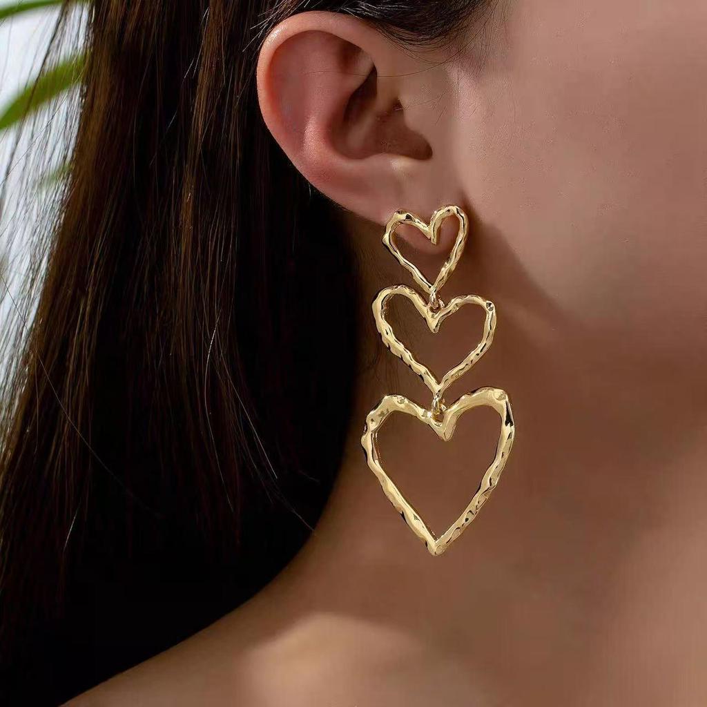 Versatile European & American Heart Drop Earrings - Slimming, Irregular Design, Hollow Heart Shape