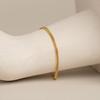 Gold Stainless Steel Double-Sided Cuban Chain Bracelet: Titanium Minimalist Women's Geometric Design.