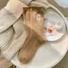 Dicke, bestickte Wollsocken für Damen im Winterstil