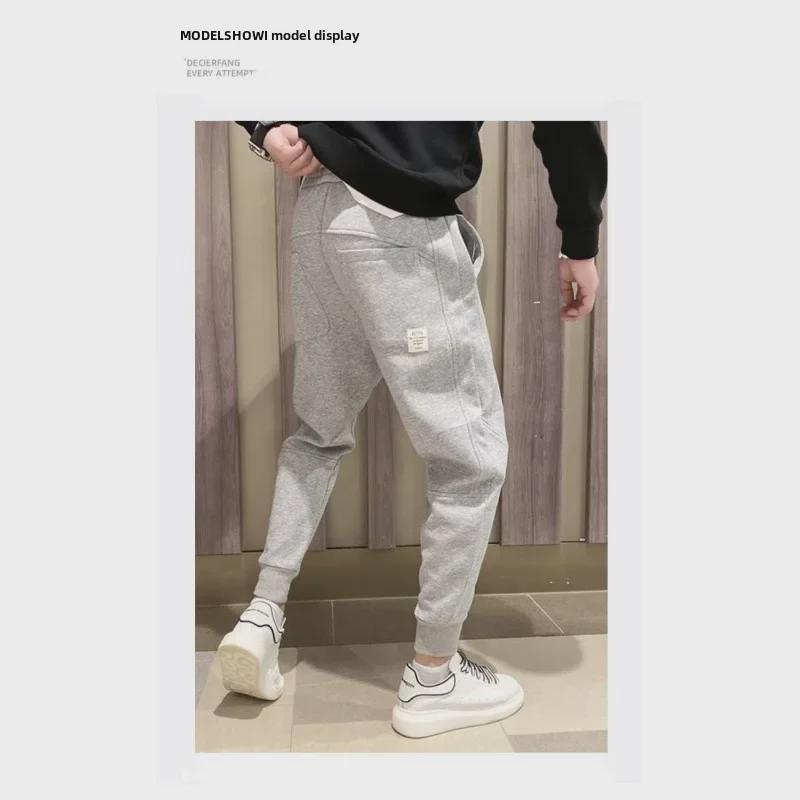 

Мужские серые повседневные свободные спортивные штаны в корейском стиле Nine-Point на весну и осень Large светло-серый