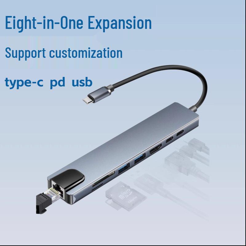 

Type-C Multi-Port Hub: USB Splitter with HDMI, Ethernet, and Eight-in-One Docking Station.