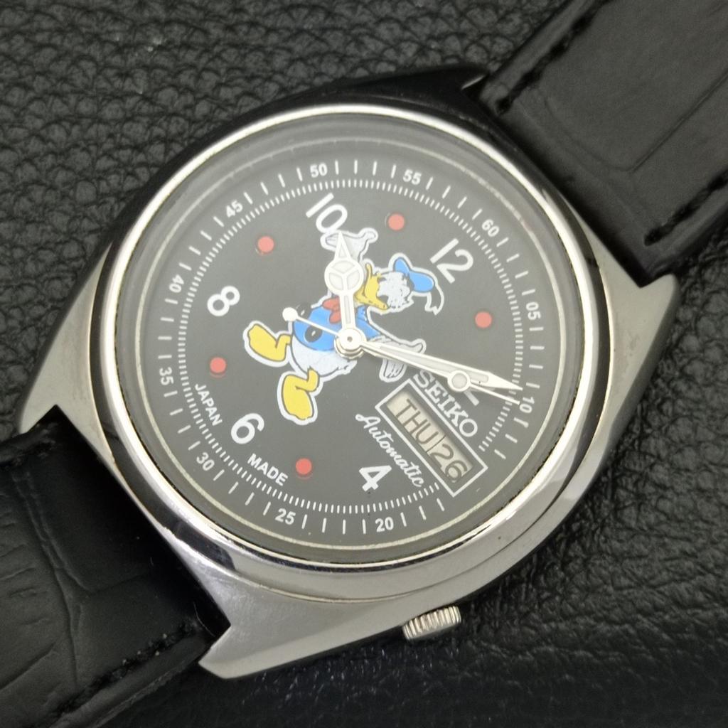 USED VINTAGE SEIKO AUTOMATIC 7009A JAPAN MENS CARTOON BLACK DIAL WATCH a433911-2 R119-a433911