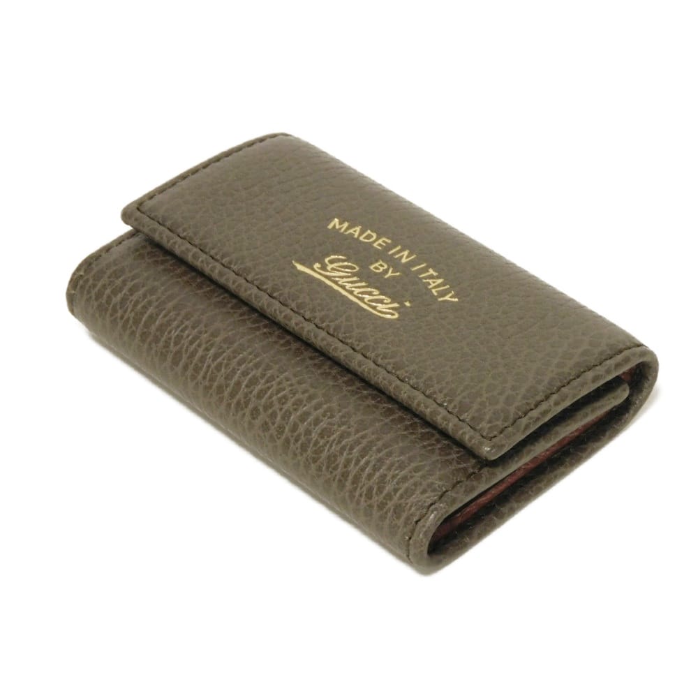 Used 6-ring keychain (product numbers 9539, 354499, CAO2G, 2160, 7949) in pink with a two-tone snap button and cursive