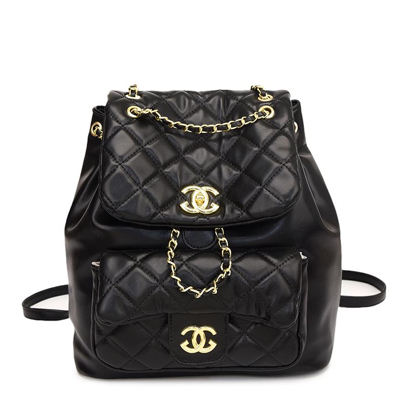 

Елегантний жіночий рюкзак-сумка через плече з вишивкою у вигляді ромбів, широкими плечовими ременями та магнітною застібкою - Жіноча розкішна сумка. чорний