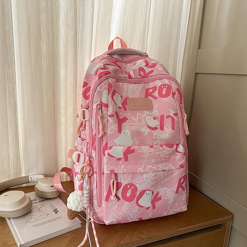Backpack female junior high school college students high value new large capacity graffiti design sense backpack female