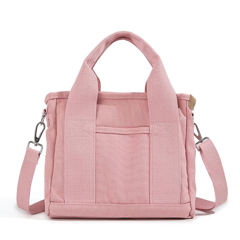 

High-value new Japanese canvas bag, fashionable and simple large-capacity tote bag, daily commuting multi-purpose bento bag for women розовый