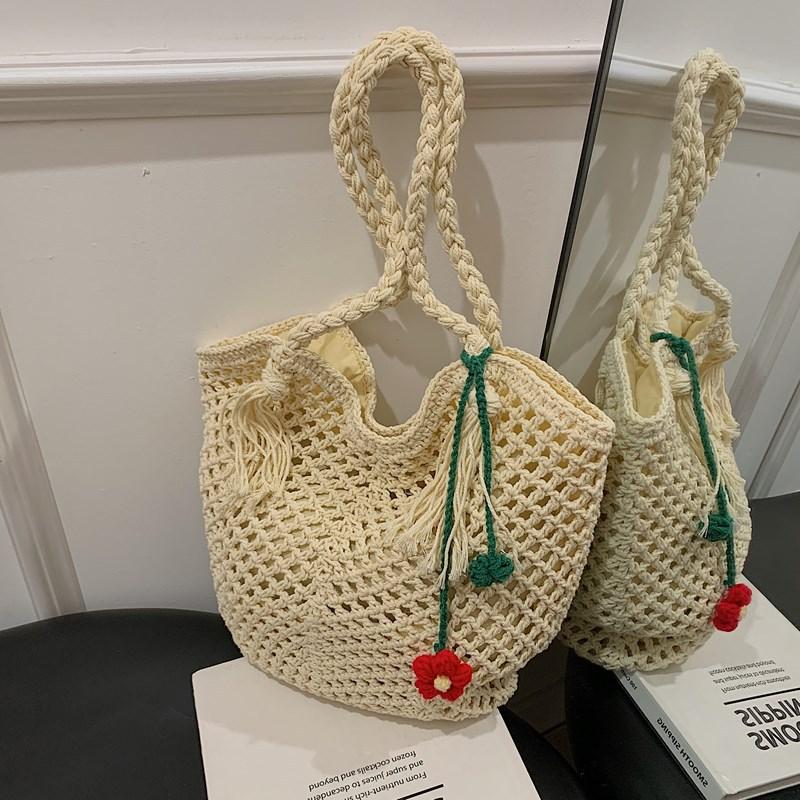 

Casual large-capacity cotton thread woven bag New hollow straw bag Lazy wind shoulder bag Beach bag Women s bag білий