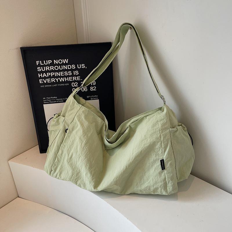 

Minimalist Large Capacity Canvas Crossbody Tote - Casual Lazy Style for Travel & Commute. світло-зелений колір