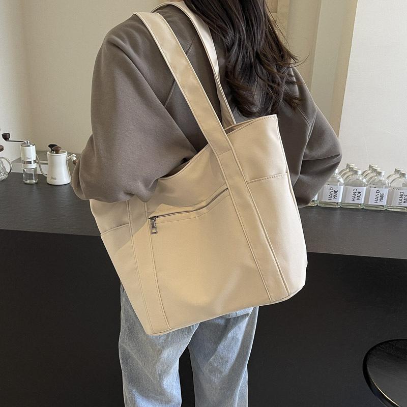 Simple commuter leisure large-capacity tote canvas bag high-value literary college student class women's shoulder bag bag