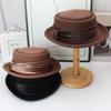 New warped edge wool top hat British retro autumn and winter jazz hat European and American women's short brim fashion versatile hat