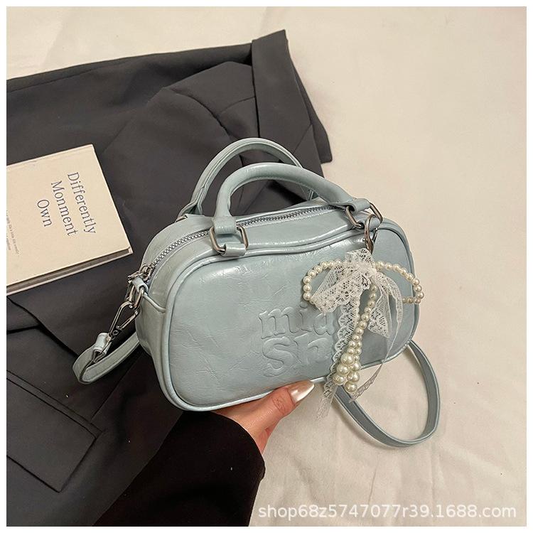 High-end niche bag women's 2025 new PU soft-faced shoulder messenger bag large-capacity trendy portable Boston bag
