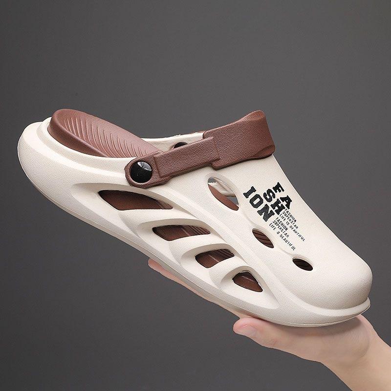 

Новые летние прохладные тапочки модные трендовые мужские тапочки повседневные мягкая подошва для улицы толстая подошва пляжные домашние тапочки мужские 44-45 [One size smaller]