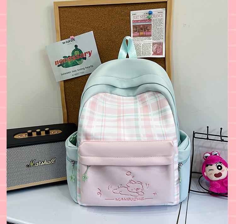 Schoolbag New Japanese plaid schoolbag for women, junior high school students Large capacity, light and wear-resistant cute cartoon backpack