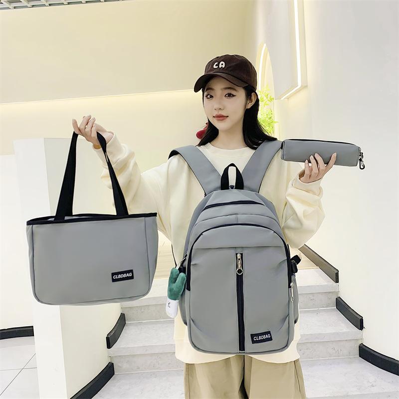 TS JYL laptop bag,New Wholesale 3 Sets School Bag Primary Junior Light Solid Simple Bag
