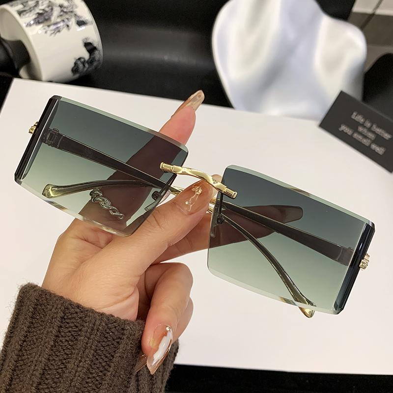 New Curved Lens Leopard Head Metal Frameless Edge Cutting High-Quality Sunglasses 90300