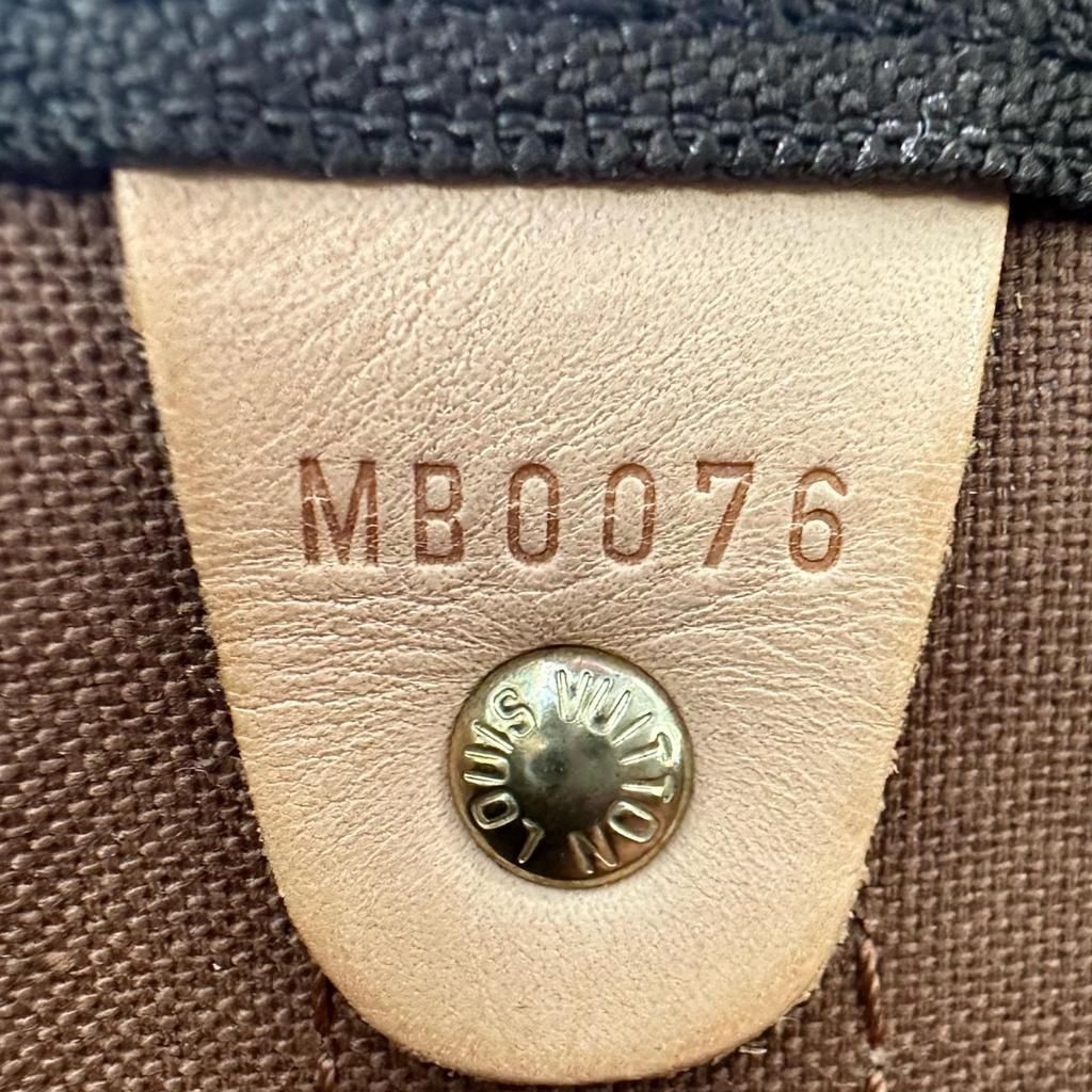 LOUIS VUITTON Monogram Keepal Band Lierre 55 Boston bag Brown Women used