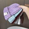 Women's autumn and winter wool jacquard letter labeling wool hat casual thermal bald hat women's loose knitted stacking hat