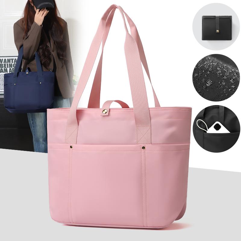 Women's portable folding storage bag with multiple compartments and adjustable shoulder strap for large capacity.