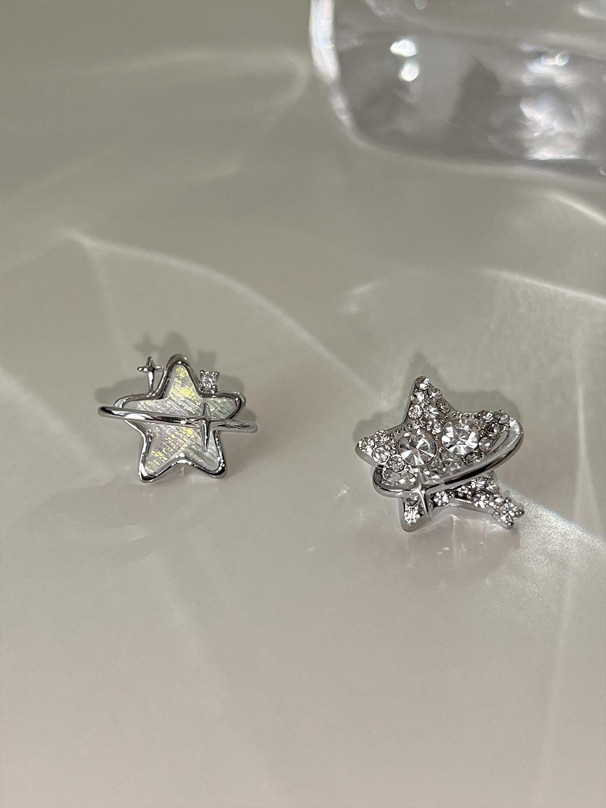 

925 silver needle shining three-dimensional star stud earrings women s niche high-end asymmetric zircon earrings temperament earrings 925 silver needle