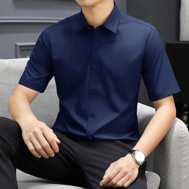 

New Men s Business Casual Solid Color Short Sleeved Shirt for Summer Fashion No Ironing Comfortable and Versatile Top 4XL темно-синього кольору