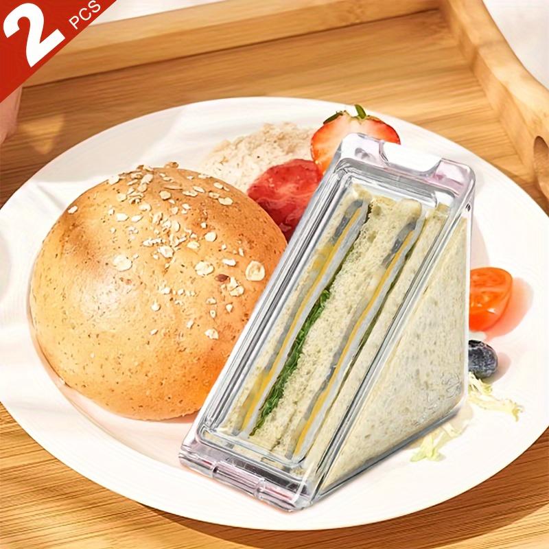 Dva svačinové boxy, bento boxy, krabičky na sendviče. Otevírá se do strany pro snadný přístup k jídlu, podporuje čištění a lze jej znovu použít.