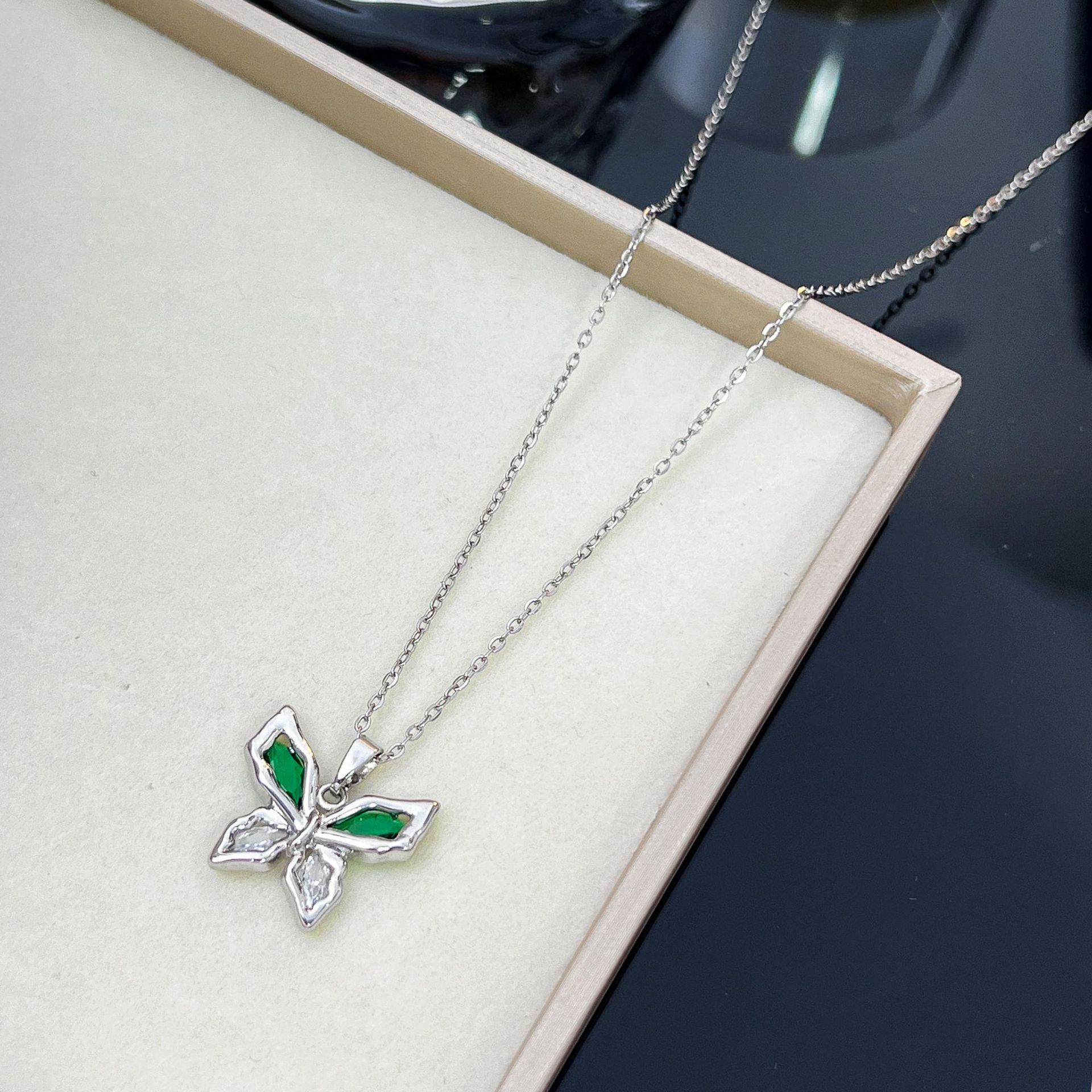 Elegant Titanium Butterfly Necklace with Green Diamond Pendant
