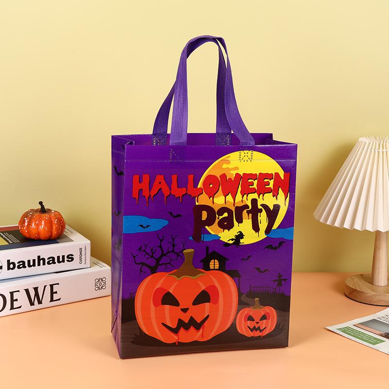 

1pc Halloween Theme Non-woven Cloth Gift Shopping Bag with Handle Reusable Pumpkin Bat Creative Trick or Treat Goodie Bags фіолетовий