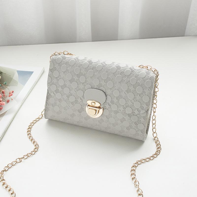 New women's bag, small square bag, shoulder messenger bag, lock bag, fashionable embossed mobile phone bag.