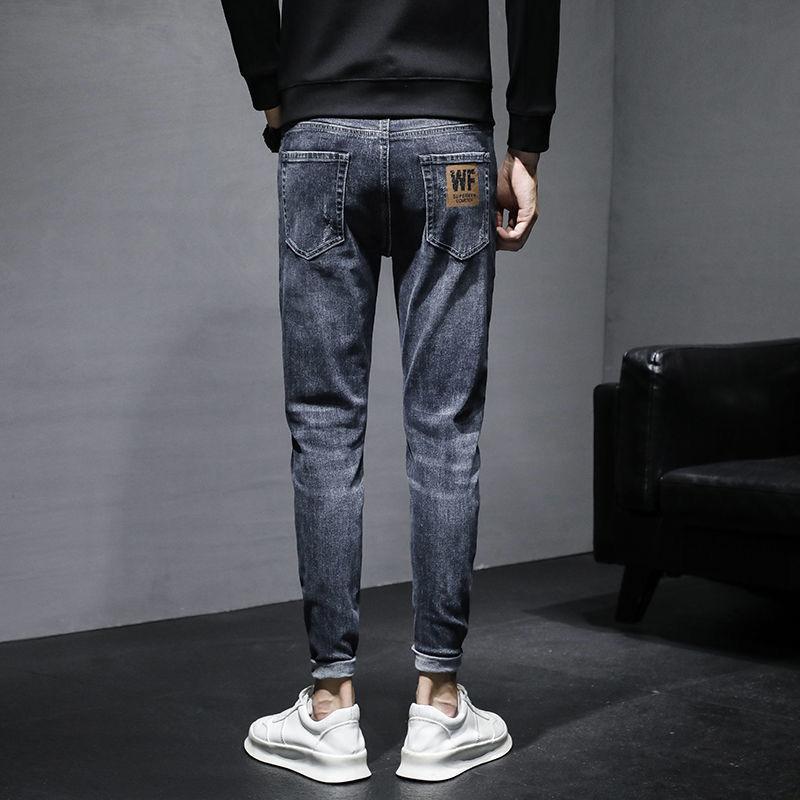 Vaqueros para hombre marea versión coreana de la marea de primavera y otoño flujo Slim pies pequeños nuevo verano sección delgada pantalones largos vaqueros negros para hombre