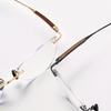 Frameless Sandalwood Glasses: Pure Titanium Butterfly Frames with Myopia-Ready Flat Lenses