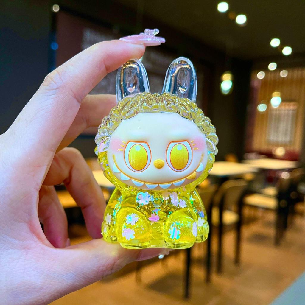 Kurutulmuş Çiçekler, Yanıp Sönen Renkli Boncuklar ve Yağ Şişesi ile Mengmeng Tavşan Hareketli Kum Süsleri - Sevimli Tahıl Aksesuarları ve Douyin'de Trend Oyuncaklar.