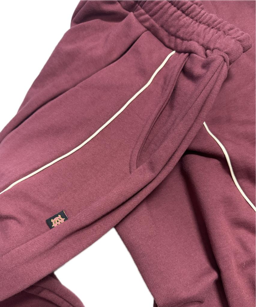 Aseuteleuwoldeu Symbol Logo Two-Tuck Cotton Track Pants (Burgundy)