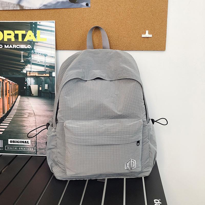 School bag Korean version ins high value backpack early high birth girl casual simple commute versatile large capacity