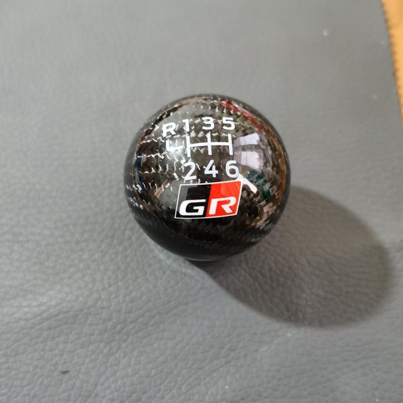 

New 6 Speed Racing Carbon Fiber Gear Shift Knob For toyota GR Sport Gazoo Racing GT86 GR 86 With Logo Auto Styling Accessories